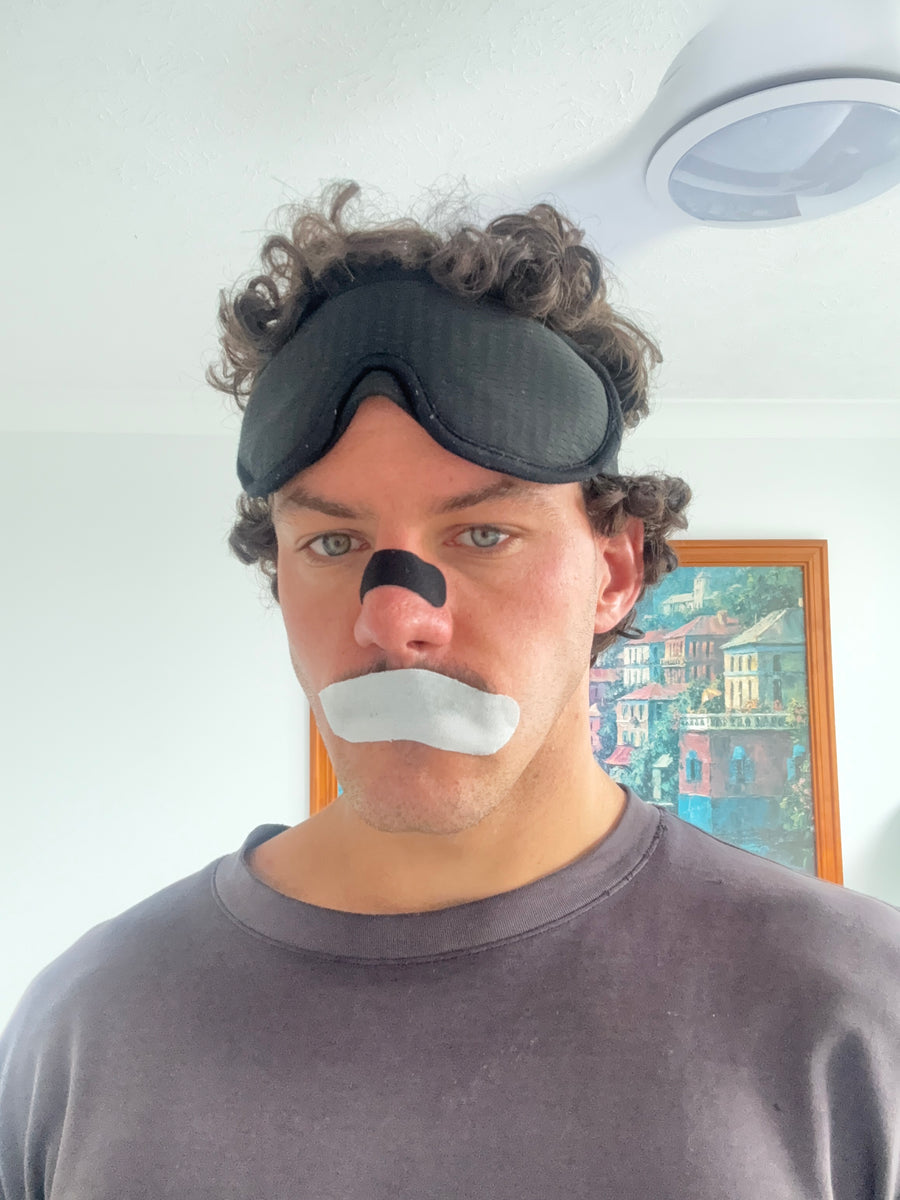 Rory wearing the sleep mask, nose strip and mouth tape